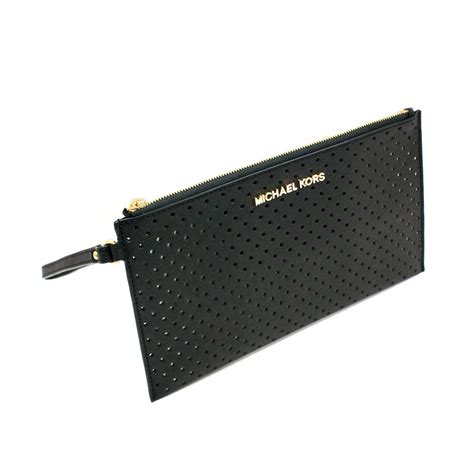 michael kors jet set travel zip clutch|Michael Kors clutch.